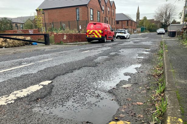Potholes in Kerrera Drive in Salford
