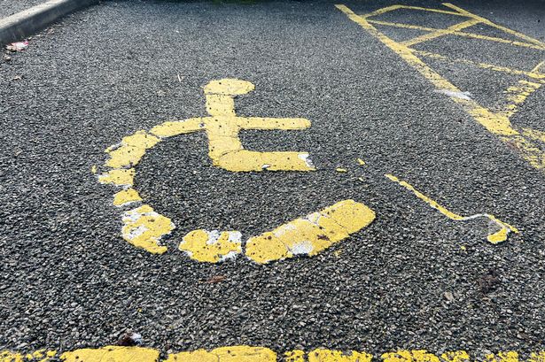 Fake Blue Badges are causing issues for people with a genuine need to use disabled bays, a charity has warned (Image: Declan Carey)