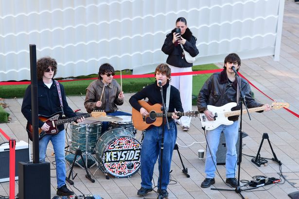 Oisin McAvoy, Max Gibson, Daniel Parker and Ben Cassidy from Keyside playing a gig in Liverpool One