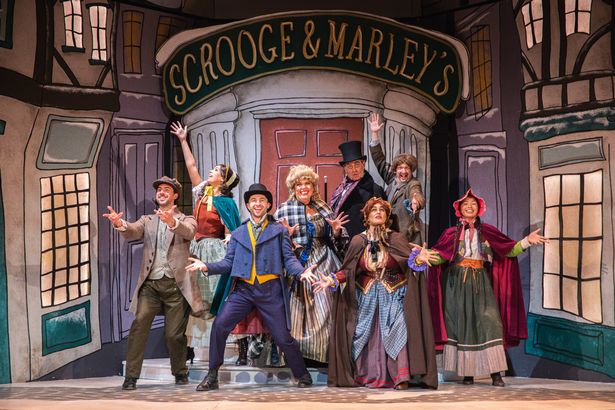 The Scouse Christmas Carol From Left John-Paul Birss, Lydia Rosa Morales Scully, Adam McCoy, Lindzi Germain, Paul Duckworth, Helen Carter, Lenny Wood, Jhanaica van Mook. Image credit AB Photography (1)