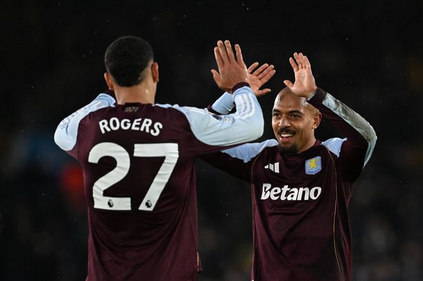 Donyell Malen celebrating Morgan Rogers' free-kick goal against Leeds United