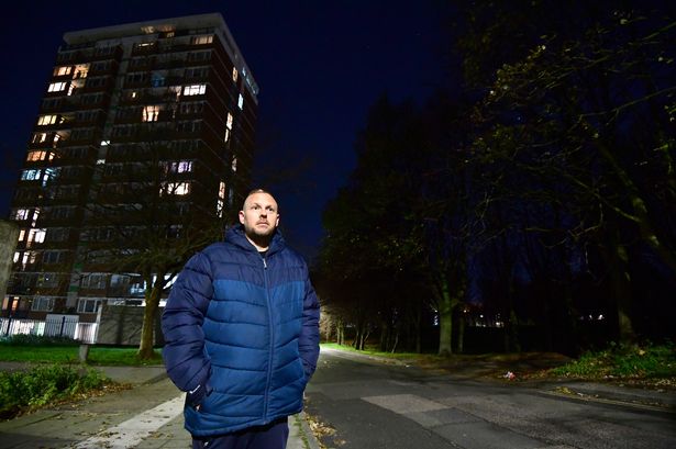 Lib Dem campaigner Kevin Robinson-Hale on the dimly lit Conway Street