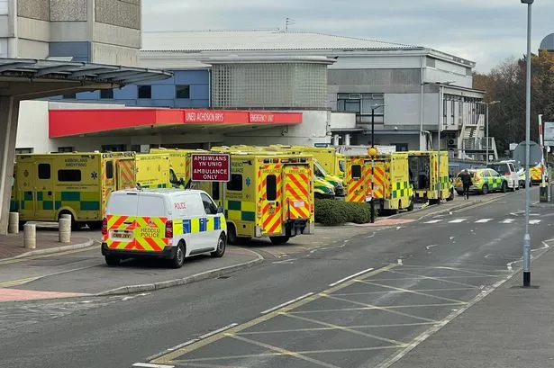 Ambulances queuing outside the University Hospital of Wales in Cardiff 