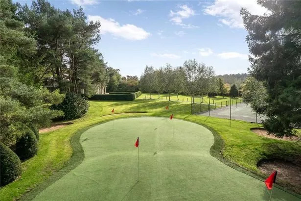 Mark Hughes' Cheshire mansion boasts a tennis court and golf green