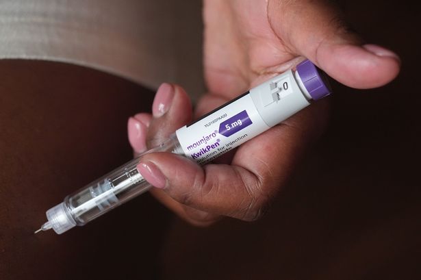 A person uses a 5mg pre-filled injection pen of Mounjaro