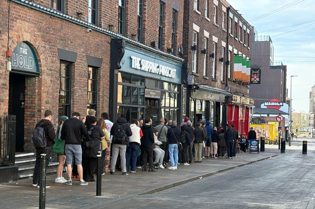 Queues outside The Jacaranda on Slater Street
