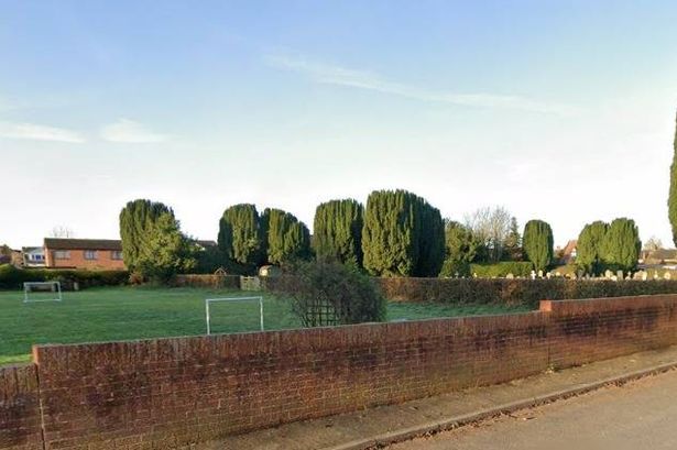 Plans to extend Overton Cemetery - seen here in the background - into the neighbouring playing field to add 178 burial plots have been submitted to Wrexham's planning department. Pic: Google Street View.