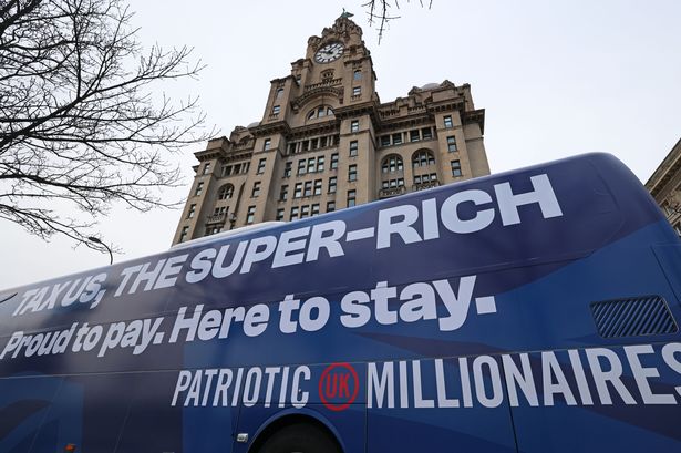 The Patriotic Millionaires campaign bus in Liverpool.