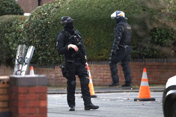 Police on Arncliffe Road in Halewood on Monday November 5