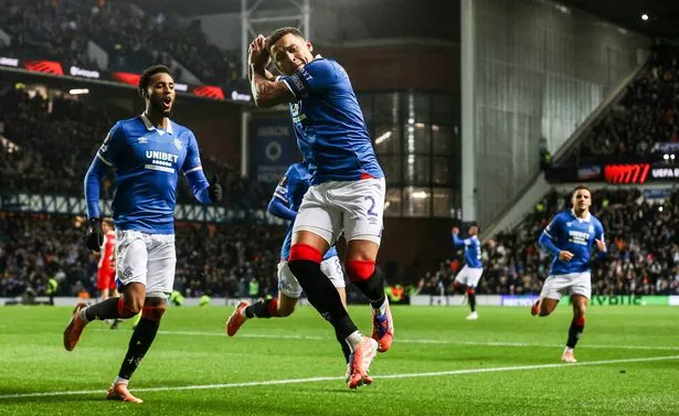 Rangers' James Tavernier celebrates as he scores from the penalty spot to make it 1-0