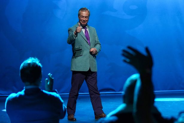 Reform UK Leader Nigel Farage attends a rally at Venue Cymru