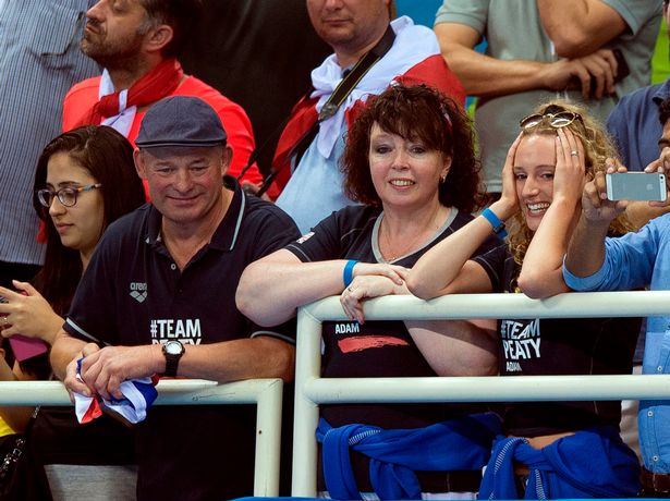 Pic by Staff Andy Stenning
Adam Peaty wins gold and smashes world record winning his final in the100m Breastroke final at Rio2016 Olympics. watched by his mum and dad Caroline and Tom and girlfriend Anna Zair
