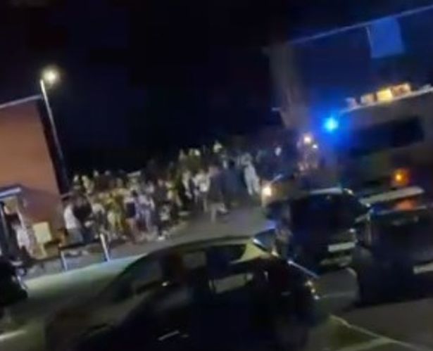 Crowds leave the gathering after a 'disturbance'