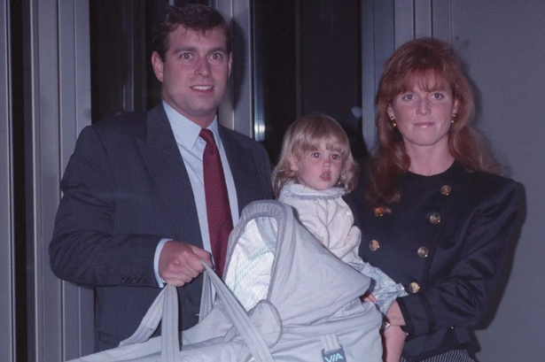 The Duke and Duchess of York at Heathrow Airport with their two daughters, Beatrice (in the Duchess's arms) and Eugenie (in the cot)