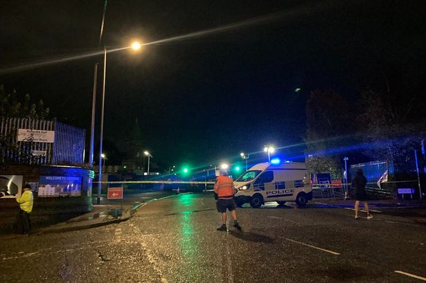 A cordon remains at the scene in Stockport 