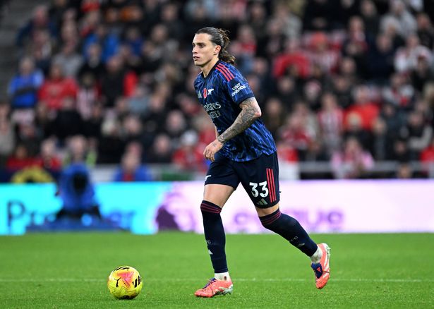 Riccardo Calafiori runs with the ball