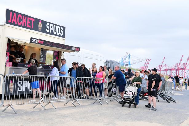 The queue for Jacket Spuds from Spudman on Crosby Beach this afternoon