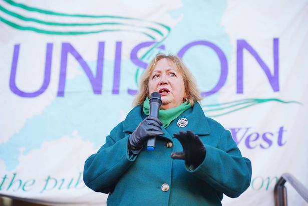 UNISON general secretary Christina McAnea joins Phlebotomists in Gloucestershire, members of Unison, marking their 236th day of industrial action during a rally outside Gloucester Shire Hall. The specialist health workers are said to be involved in the longest walkout by NHS employees. The 36 specialist staff, who take and handle blood samples from patients, have been on strike since March in a dispute over pay. Picture date: Monday November 17, 2025.