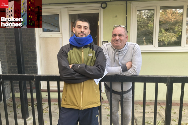 Two men pictured outside a flat, one leaning on a railing and the other folding his arms