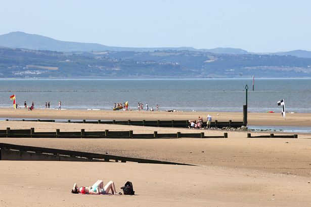 Warm weather brings the crowds to Rhyl beach