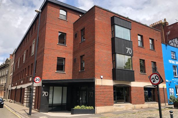 Four-storey office building on the corner of a road junction