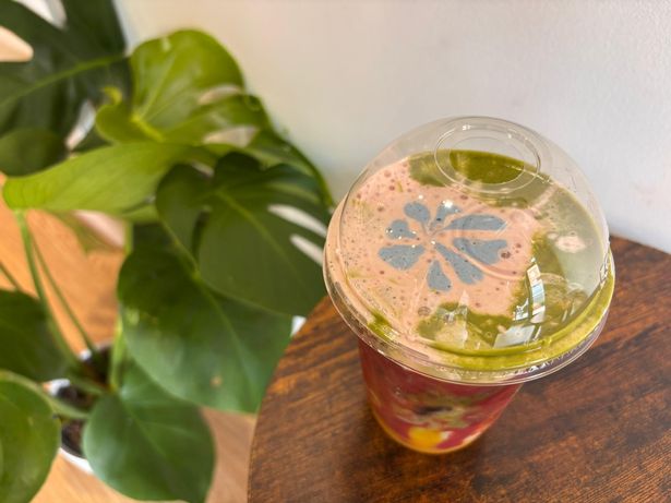 Mango and raspberry cold matcha drink with a cloud foam top from Sips & Stories on Smithdown Road