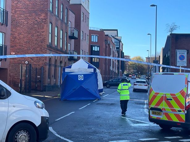 Police at the scene in Sand Pits, at the junction of Clement Street