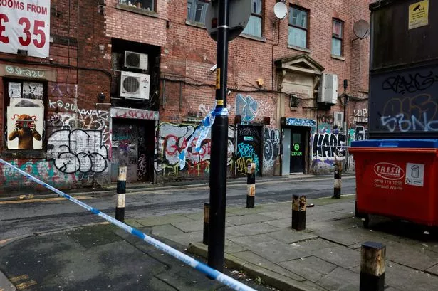 A cordon in place on Spear Street, near Back Piccadilly