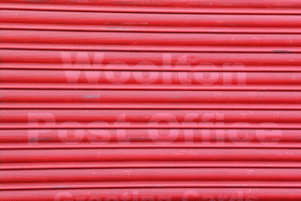 Shutters have been pulled down for over a week at Woolton Post Office.