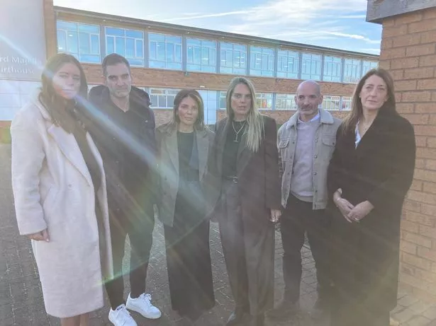 The Marco family outside court