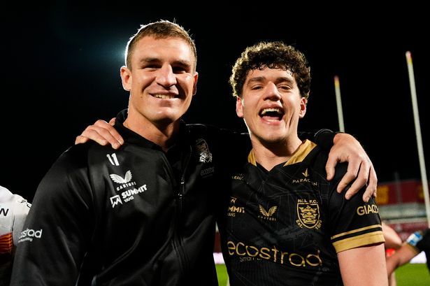 Jed Cartwright and Lewis Martin celebrate a Hull FC win.