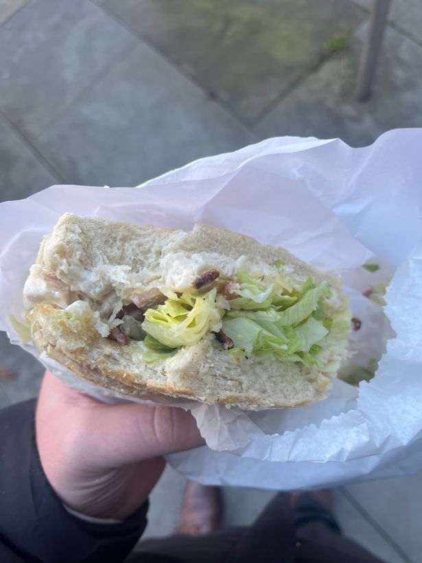 The inside of the chicken club sandwich with all the fillings