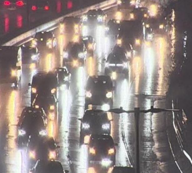 Cars driving on the M4 in rain