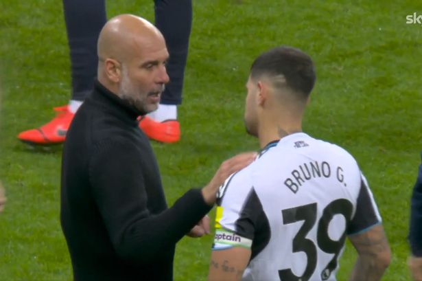 Pep Guardiola speaks to Bruno Guimaraes