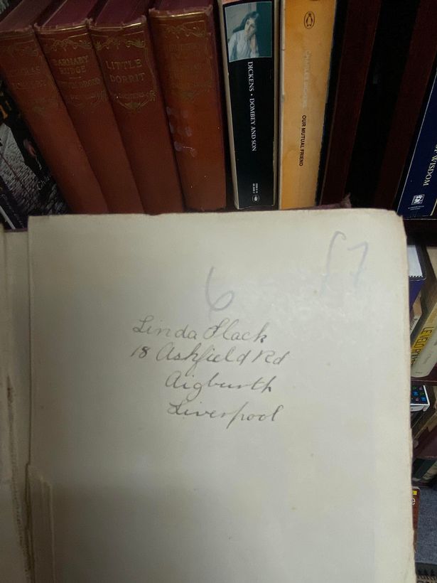 A note inside a copy of A Tale of Two Cities by Charles Dickens reading "Linda Flack 18 Ashfield Road Aigburth Liverpool"