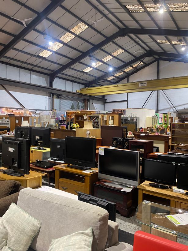 TVs downstairs at Emmaus charity shop