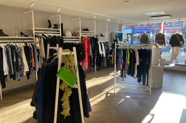 Racks of clothing inside North West Cancer Research 