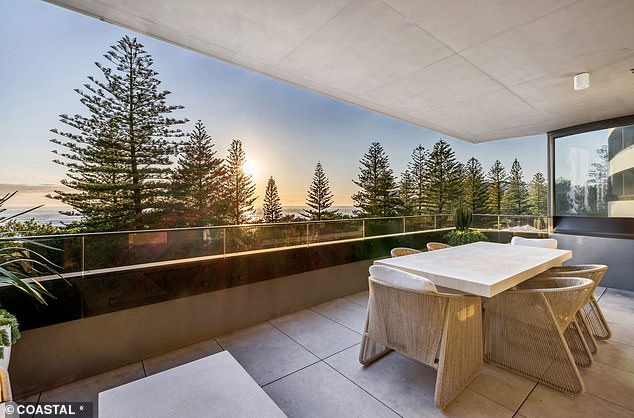 The open-plan apartment spans 183 square metres and features a covered patio overlooking the block's exclusive pool and 'party deck'