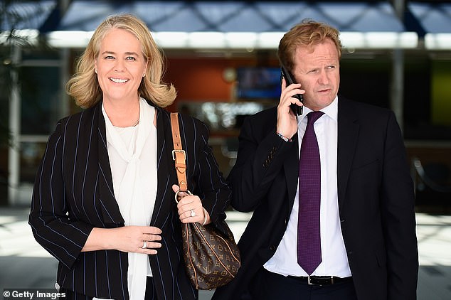 He is due to buy a minority stake in the footy club and will join up with current majority owner Rebecca Frizelle (left, with ex-NRL CEO Dave Smith)