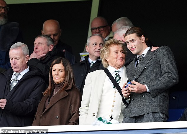 The British singing icon, 80, was spotted in at Hampden Park enjoying the football game alongside Alastair, 19