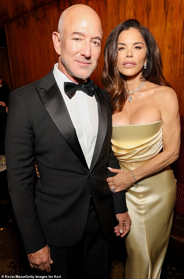 Jeff Bezos, pictured with wife Lauren Sanchez-Bezos, has invested in a biotech firm, Altos Labs, to see if they can find a way to activate genes that may rejuvenate human cells