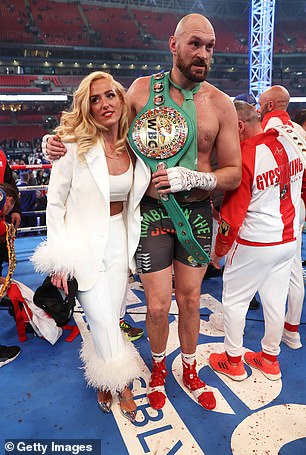 Paris stood by her husband's side after his victory Dillian Whyte in 2022