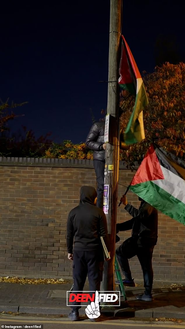 The hooded and masked activists attached Palestinian flags to telegraph poles just metres away from the grounds of Aston Villa stadium