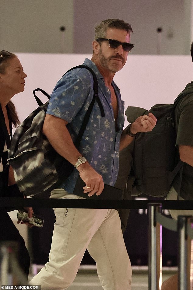 Bear attempted to dodge camera during the airport appearance