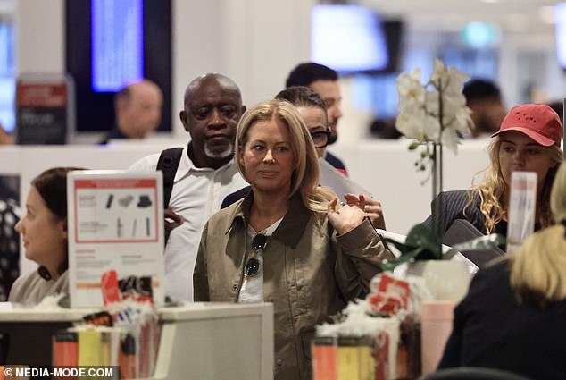 Samantha layered a cargo bomber jacket over a simple white t-shirt with a pair of jeans