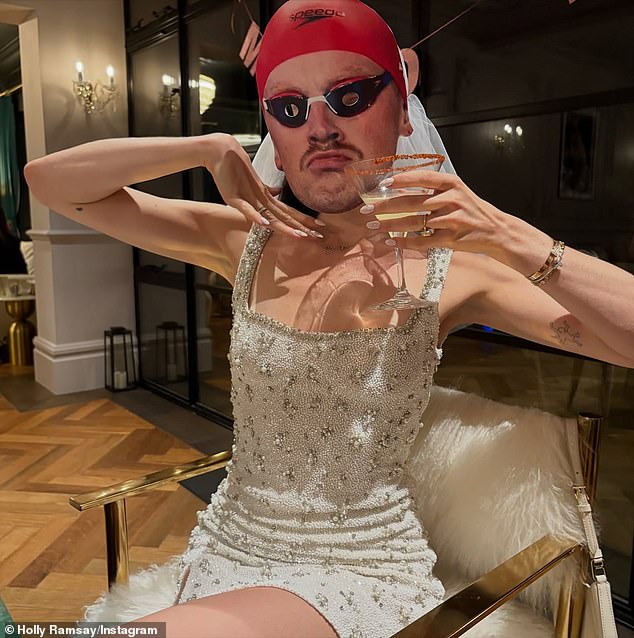 During Holly's star-studded hen party, guests donned masks of Adam's face, complete with swimming goggles and cap, as they sipped spicy Margaritas at the private soirée