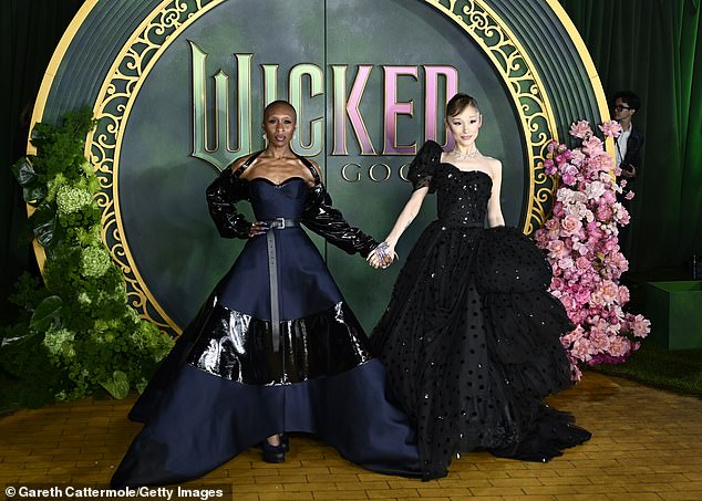 Ariana Grande and Cynthia Erivo swapped their trademark pink and green looks for dark sultry gowns as they attended the UK premiere of Wicked: For Good on Monday