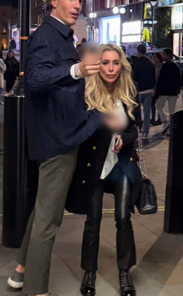 Police released this photo of two people they want to talk to after a family was allegedly racially abused and assaulted in central London (image blurred at source by British Transport Police)