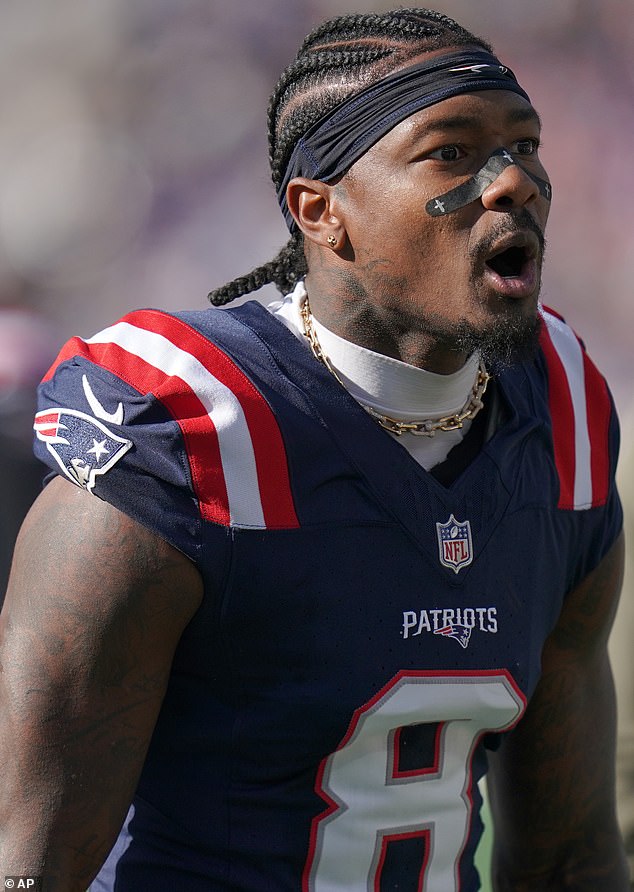 'It's a boy. That's enough for me. I can't wait to make him do push-ups and sit-ups and run around,' the NFL player said; seen above earlier this month in Massachusetts