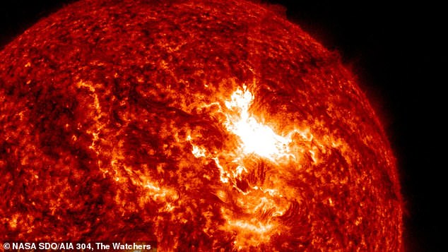 On Tuesday, a massive solar flare burst out from the Sun triggering a coronal mass ejection (CME), a huge cloud of solar material and magnetic fields, that races towards the Earth at about 3,000 miles per second